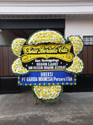 Papan Bunga Duka di Dokome